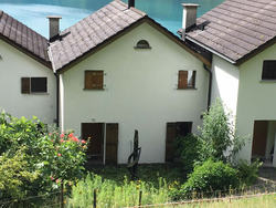 Algenmann Schweiz - Haus in Quinten SG - Fassadenreinigung mit 5 Jahren Garantie